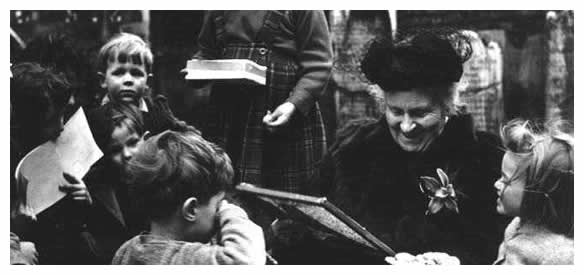 Maria Montessori with children