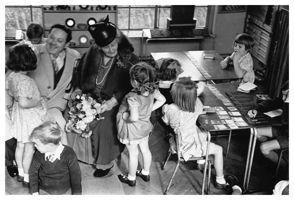 Maria Montessori with a class